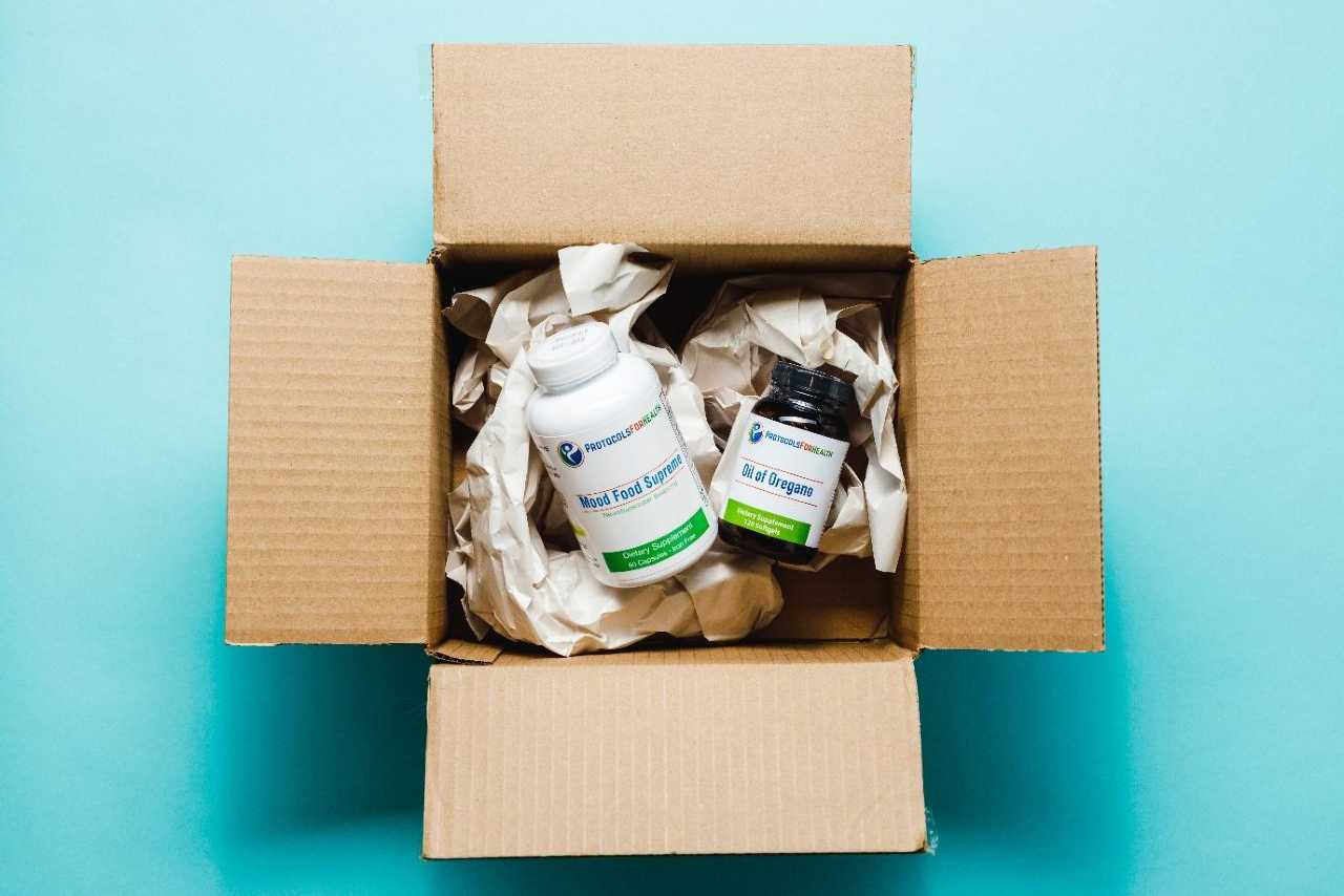 A box with two food supplement bottles inside Spotted Fox Digital