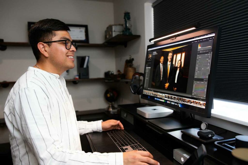 professional photographer editing photos Spotted Fox Digital