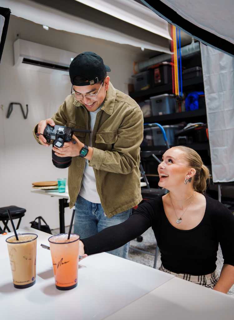 social media management expert doing a photoshoot for client's products Spotted Fox Digital Marketing